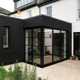 A Space Transformed: A Light-Filled Corner Extension with Origin