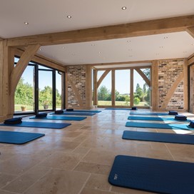 Jet Black Bifolds Set Against Oak Create An Inspirational Home And Pilates Studio
