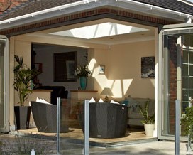 The Wilson's Bi-folding moving corner summer room