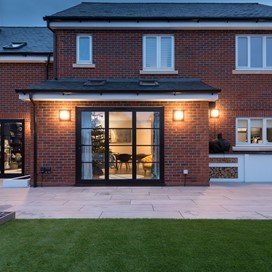 Steel Style OB-49 Bi-folds Complete This Couple's Stylish Home