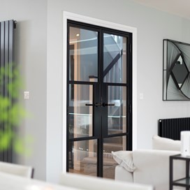 Origin Internal doors are bang on trend whilst allowing light to flood through this Country home.