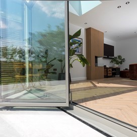 Expansive Contemporary Bifolds Seamlessly Connect Kitchen to Garden