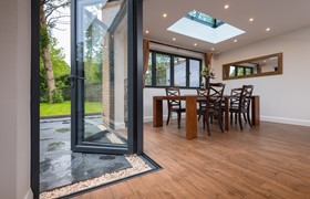 Kitchen bi-fold doors—options, sizes, costs and design ideas