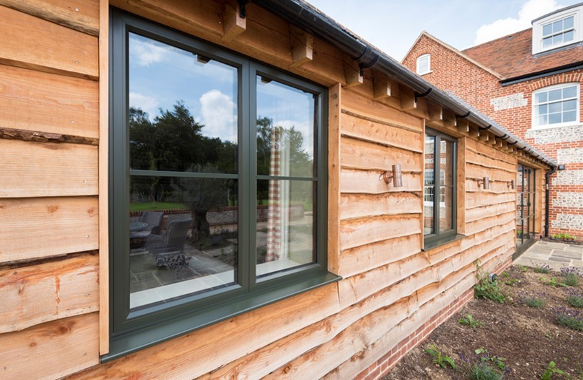 Wooden house with bifold external doors