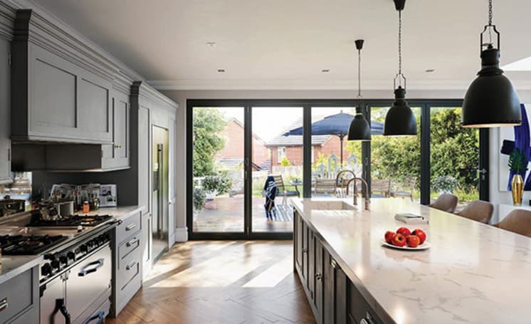 Kitchen view of a bifold door leading through to a garden