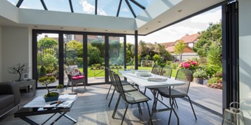Corner bi-fold doors - Showcasing how you can open just one side of the bifold doors.