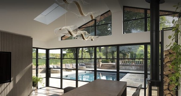 bi-fold doors by a pool
