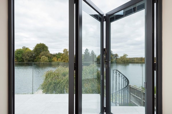 bifold doors with dog outide 