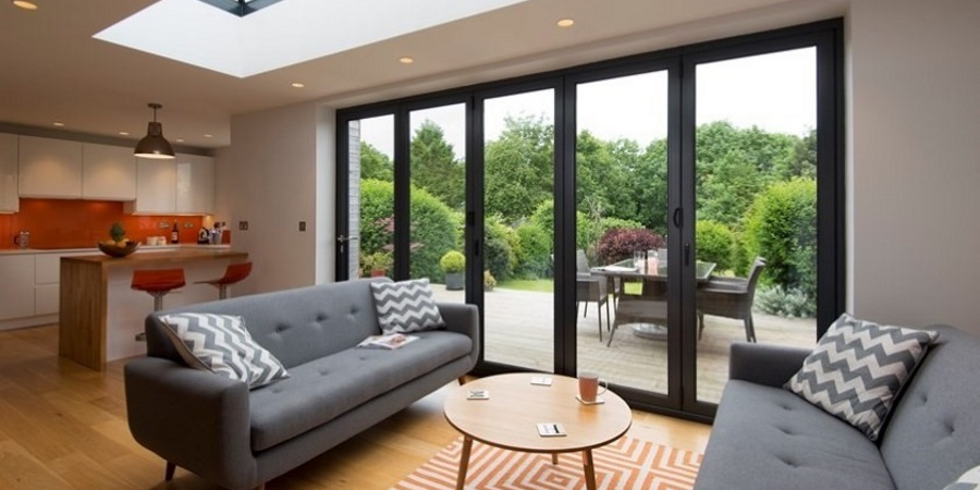 Small extensions with bi-fold doors - Open Plan Kitchen/living room with bifold doors.
