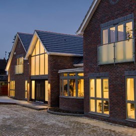 An external view of a mansion showing off Origin's beautiful range of windows