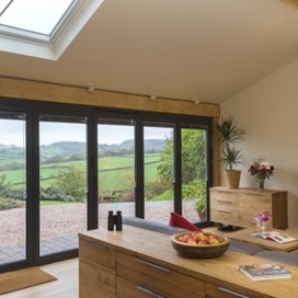 The view from within the Barton Barn extension out through Origin's closed doors