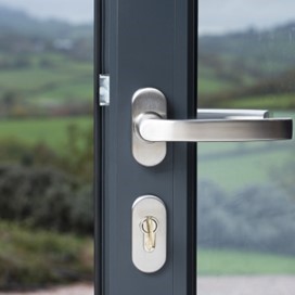 A close up of the handle of an Origin bifold door