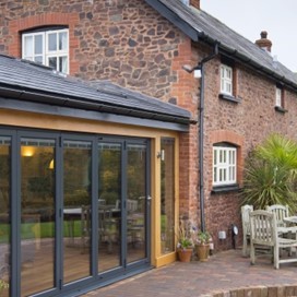 A close up view of Origin's doors used on an extension to a converted barn