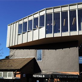 Looking up at the outside of the aluminium windows in the roof of the building