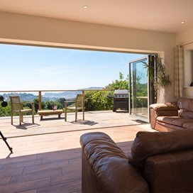 Bi-fold doors change the way this family use their coastal home