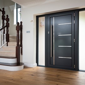 Black Origin front door from inside of a modern home
