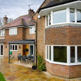 The exterior of the house featuring Origin's windows and doors