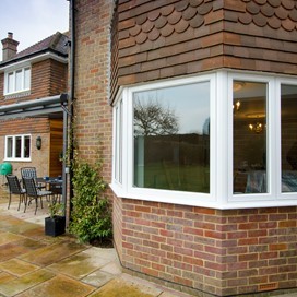 A close exterior view of the house featuring Origin's windows and doors