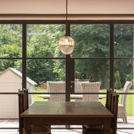 This grand country home bought to life by Origins Soho products in a dark olive green… 