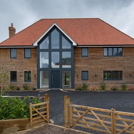 A rustic-styled wooden house given a timeless aesthetic by including a plethora of Origin products