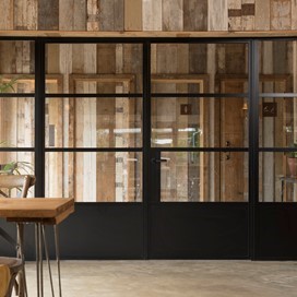 Indoor black bifold doors shut