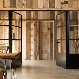 Set of open black bifold doors