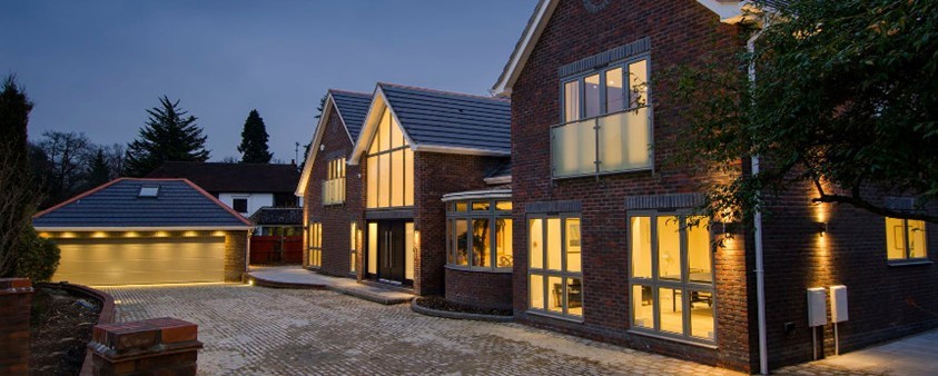 An external view of a mansion showing off Origin's beautiful range of windows