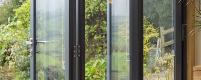 A close up of Origin's bifold doors at Barton Barn