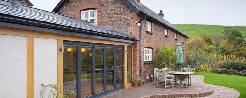 A close up view of Origin's doors used on an extension to a converted barn