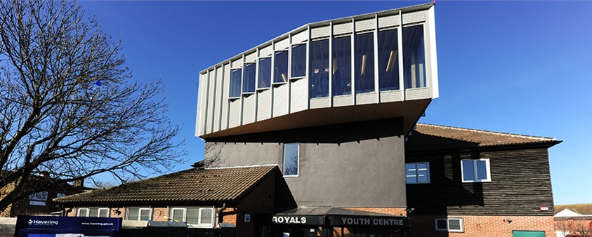 Looking up at the outside of the aluminium windows in the roof of the building