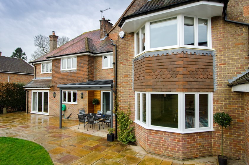The exterior of the house featuring Origin's windows and doors