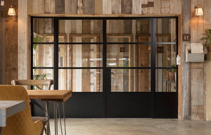 Indoor black bifold doors shut