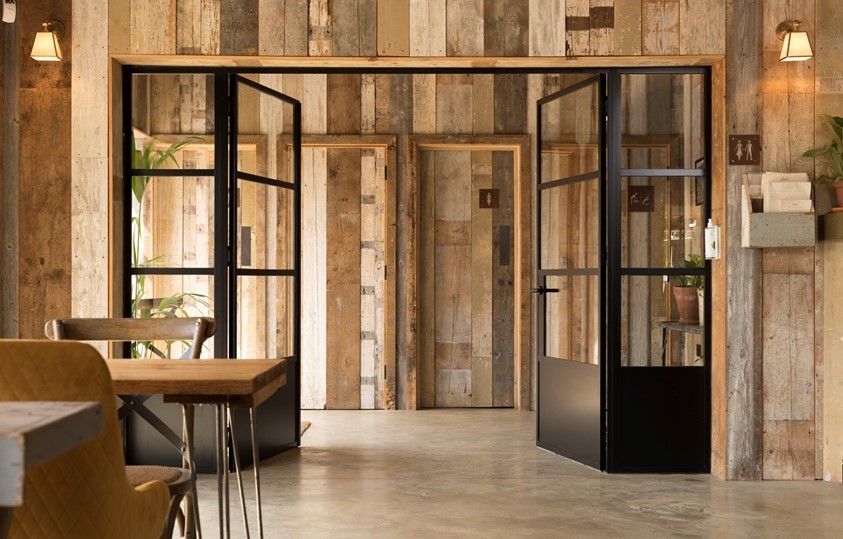 Set of open black bifold doors