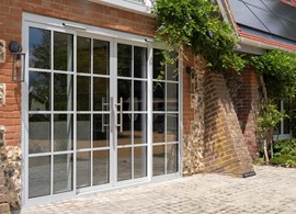 7035M Light Grey Sliding Doors with Georgian Bars Elevate a Surrey Home