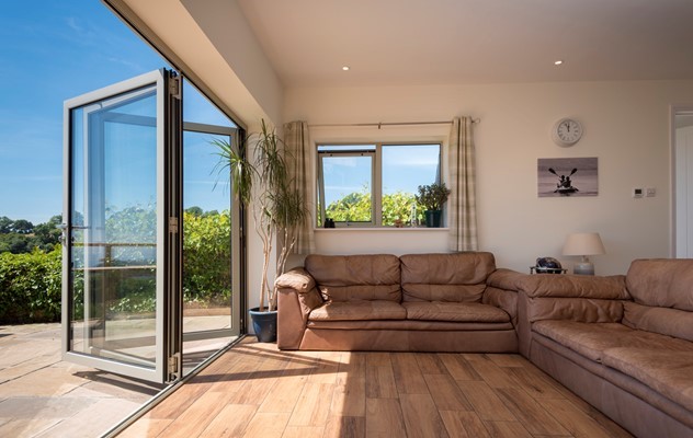 Bi-fold doors change the way this family use their coastal home
