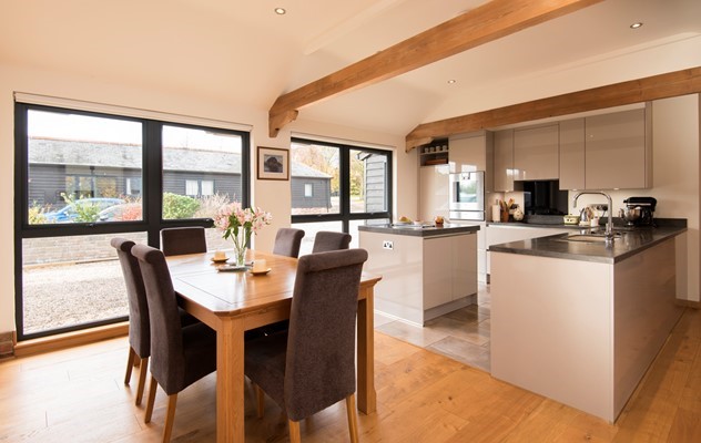 Even Bi-fold sets create a shrine of natural light to illuminate this modern bungalow.