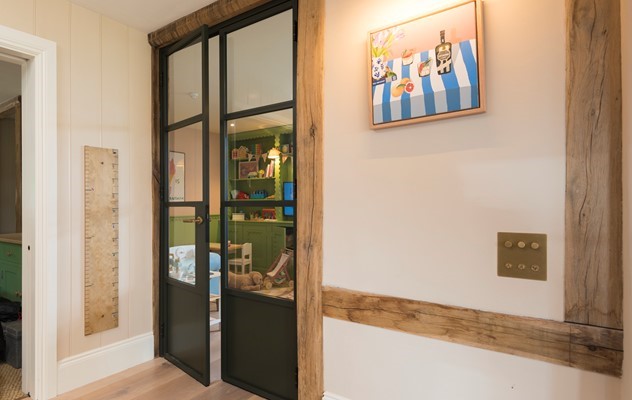 This grand country home bought to life by Origins Soho products in a dark olive green… 