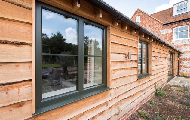 This grand country home bought to life by Origins Soho products in a dark olive green… 