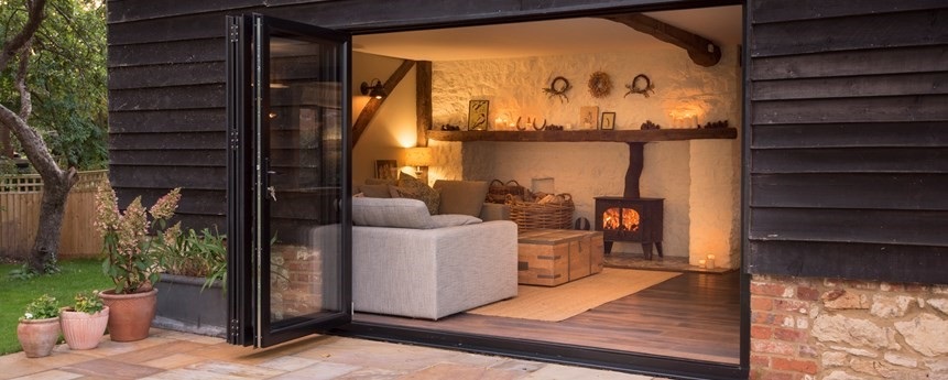 Open bifold door on a patio